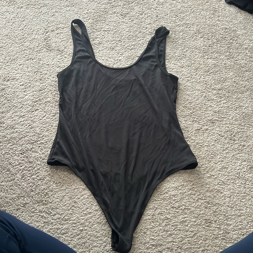 Vici size large ribbed thong bodysuit. New without tags